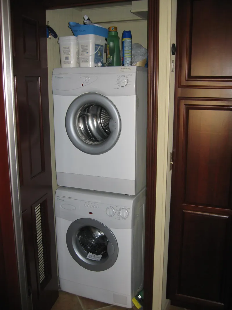 Slide: The Image of Stacked washer and dryer in compact laundry space on Skipperliner Dream Chaser Group C, 2004. - 13