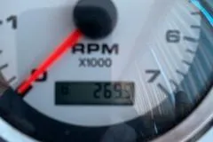 Slide: The Image of Close-up of 1960 Chris-Craft Roamer RPM gauge showing 2695 RPM. - 23