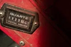 Slide: The Image of Hour meter on a 1960 Chris-Craft Roamer boat showing 323.9 total hours. - 24