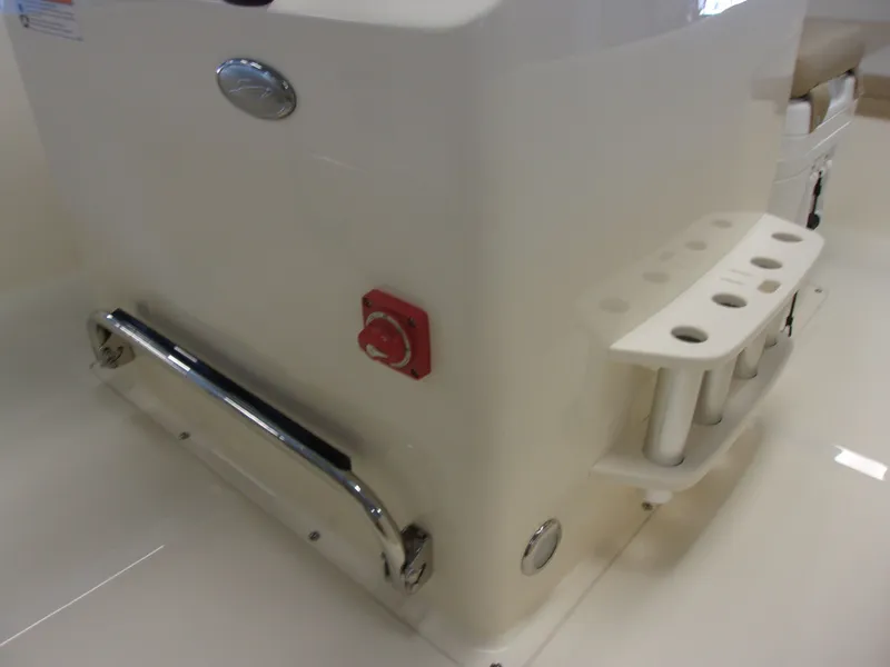 Slide: The Image of Interior of 2026 Grady-White Freedom 235 with toilet and wood flooring. - 13