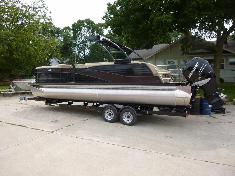 Slide: The Image of 2016 Harris Grand Mariner SEL 250 pontoon boat on a trailer. - 1