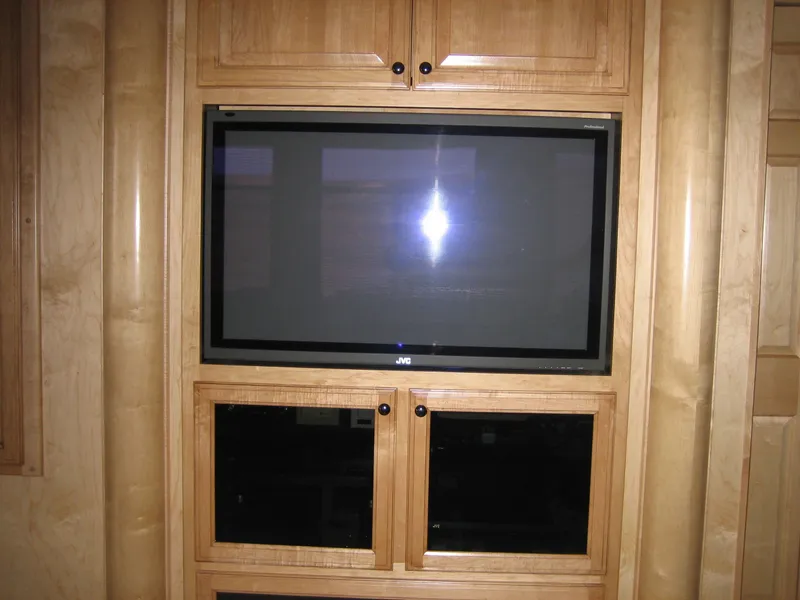 Slide: The Image of Built-in JVC TV in Sumerset Seas The Day Trip 10, 2006 model, with wooden cabinetry. - 13