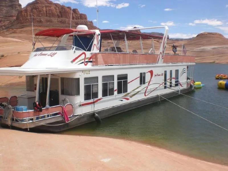 Slide: The Image of Houseboat "Just Because Week 30" by Sharpe, 2002, docked on a scenic lake. - 0