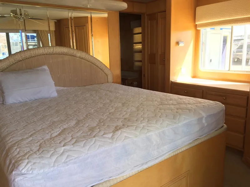 Slide: The Image of Cozy bedroom in 2002 Sharpe Just Because Week 30 houseboat with natural light. - 3