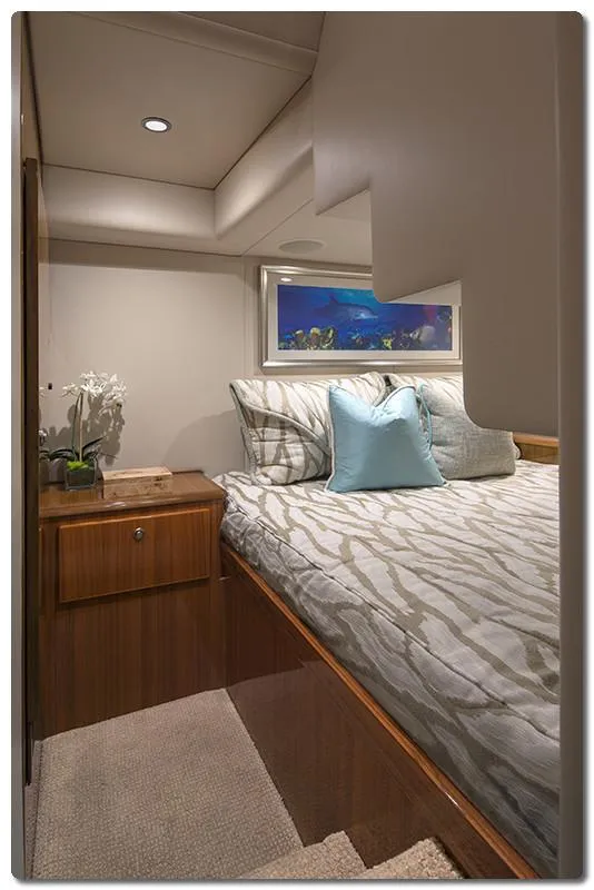 Slide: The Image of Luxurious bedroom interior of 2025 Viking 44 Open Express yacht. - 12