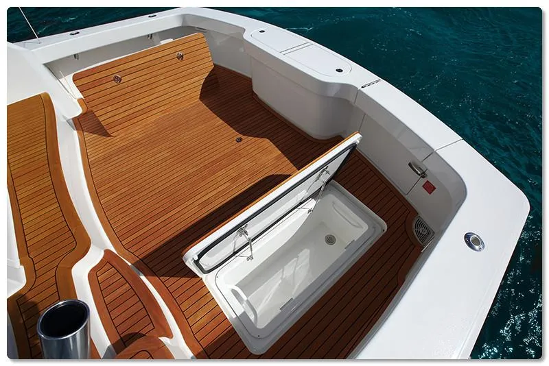 Slide: The Image of 2025 Viking 44 Open Express boat deck with storage compartment. - 14