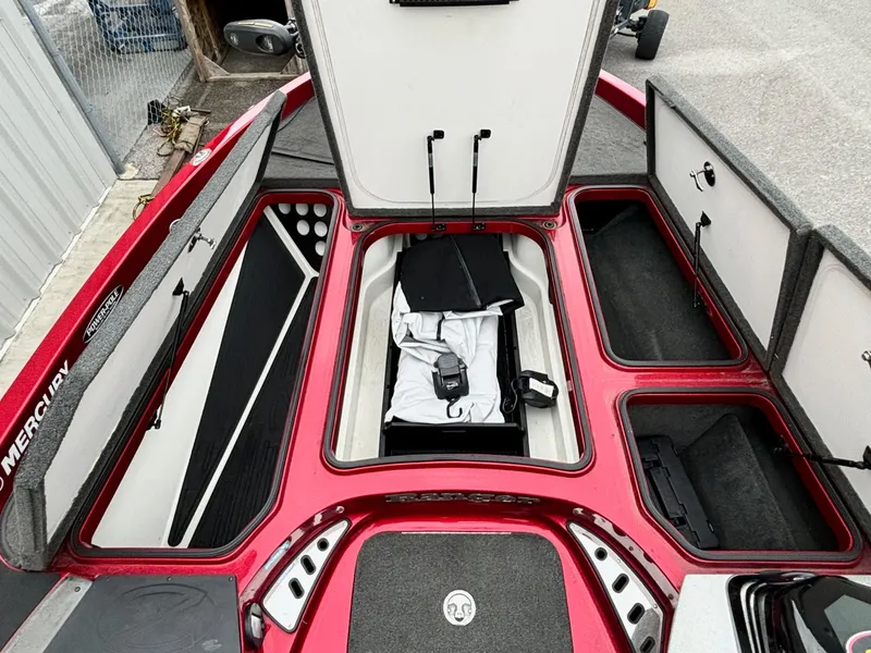 Slide: The Image of 2016 Ranger Z520 boat storage compartments, open and organized, showcasing ample space. - 6