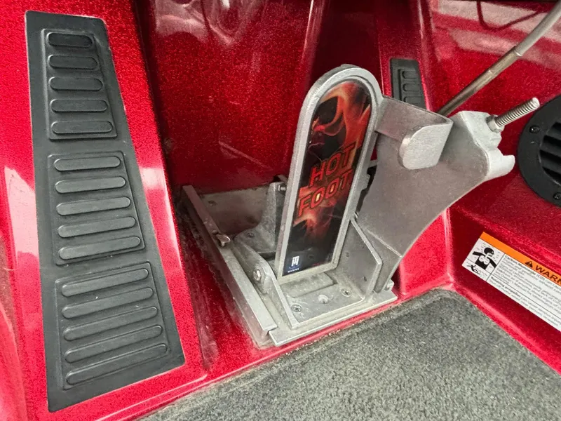 Slide: The Image of 2016 Ranger Z520 boat foot pedal with "Hot Foot" branding, red interior. - 7