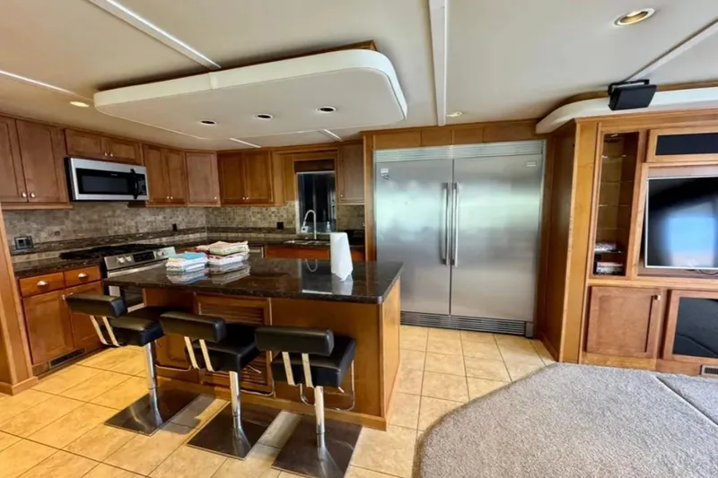 Slide: The Image of Luxurious kitchen interior on Bravada Helios Trip #7, featuring modern appliances and sleek design, 2012. - 16