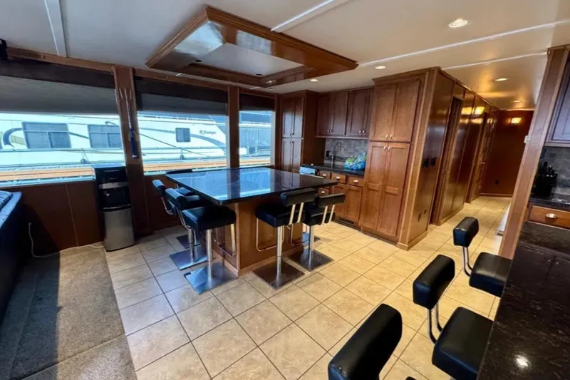 Slide: The Image of Luxurious Bravada Helios Trip #7 interior with modern kitchen and bar seating, 2012 model. - 17