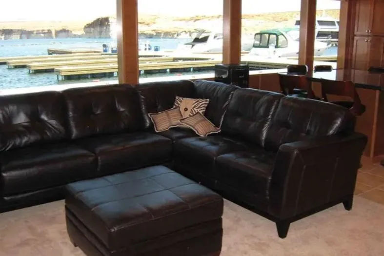 Slide: The Image of Luxurious leather sofa in houseboat interior with scenic marina view, Bravada Helios Trip #7, 2012. - 19