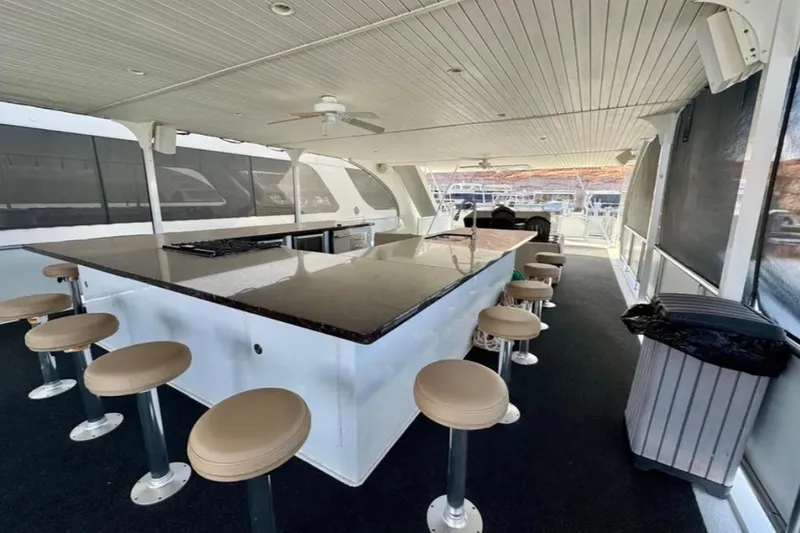 Slide: The Image of Luxurious Bravada Helios Trip #7 houseboat interior with bar and seating, 2012 model. - 25