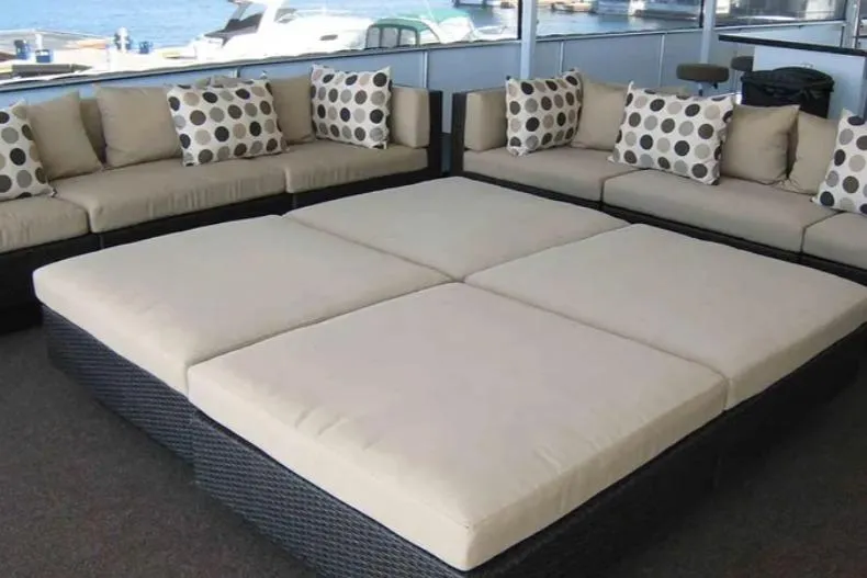 Slide: The Image of Luxurious Bravada Helios Trip 2012 yacht lounge with beige cushions and polka dot pillows. - 26