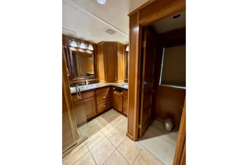 Slide: The Image of Luxurious wooden bathroom interior in 2012 Bravada Helios Trip #7 RV. - 6
