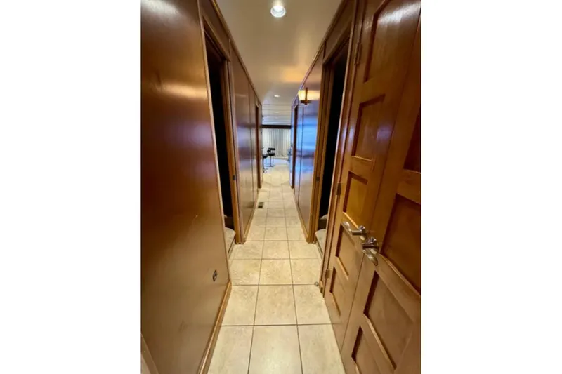 Slide: The Image of Hallway with wooden doors and tiled floor in Bravada Helios Trip #7, 2012. - 8