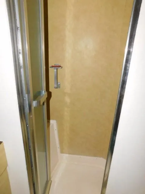 Slide: The Image of Shower area in a 1976 Bertram 42 Convertible boat. - 21