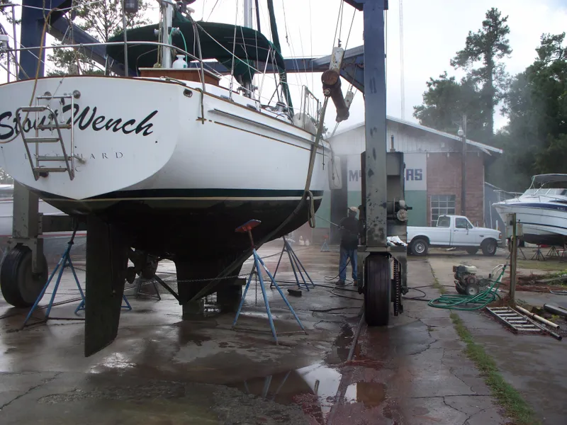 Slide: The Image of 1983 Whitby 42 sailboat in a boatyard for maintenance. - 11