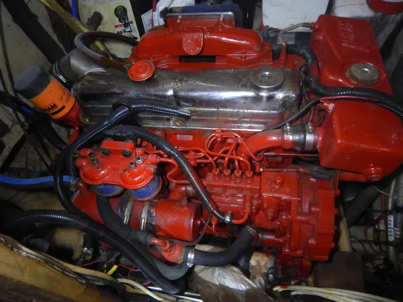 Slide: The Image of 1983 Whitby 42 engine in a boat's engine room. - 31