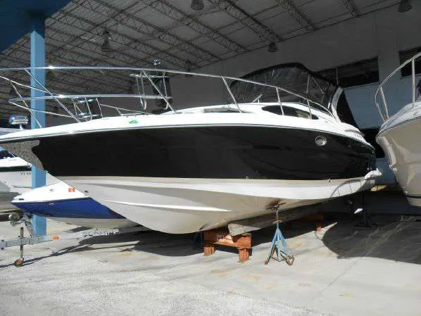 Slide: The Image of 2013 Regal 35 Express Cruiser boat in storage. - 14