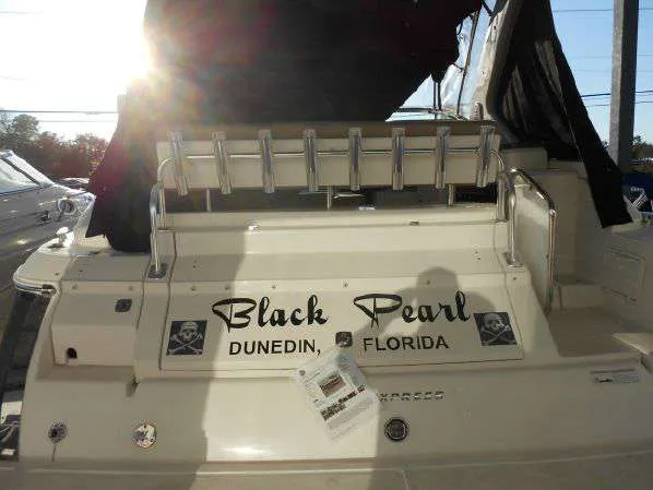 Slide: The Image of 2013 Regal 35 Express Cruiser Black Pearl docked in Dunedin, Florida. - 20