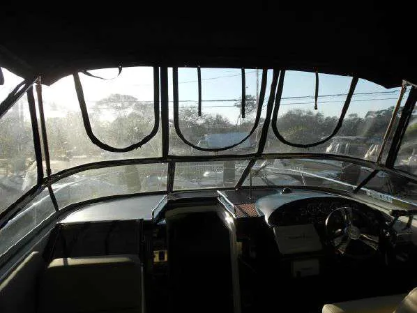 Slide: The Image of Interior view of 2013 Regal 35 Express Cruiser cockpit and helm. - 25