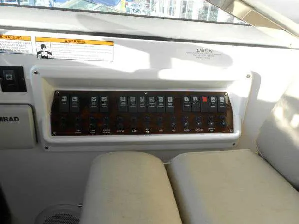 Slide: The Image of Control panel of a 2013 Regal 35 Express Cruiser boat. - 26