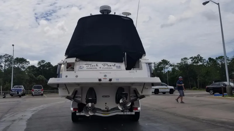 Slide: The Image of 2013 Regal 35 Express Cruiser boat on trailer, rear view. - 38