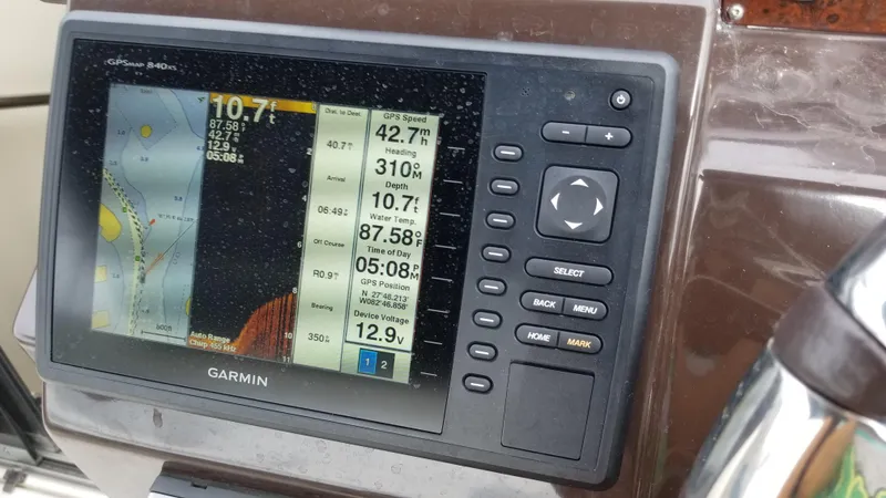 Slide: The Image of Garmin navigation system on 2013 Regal 35 Express Cruiser boat dashboard. - 4