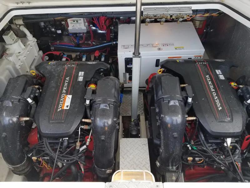 Slide: The Image of 2013 Regal 35 Express Cruiser engine compartment with twin Volvo Penta engines. - 41