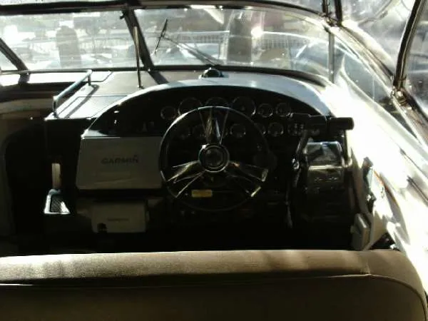 Slide: The Image of Cockpit of a 2013 Regal 35 Express Cruiser with Garmin navigation system. - 6