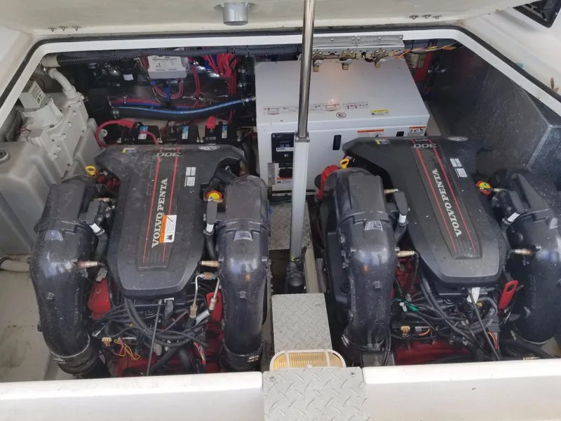 Slide: The Image of 2013 Regal 35 Express Cruiser engine compartment with twin Volvo Penta engines. - 7