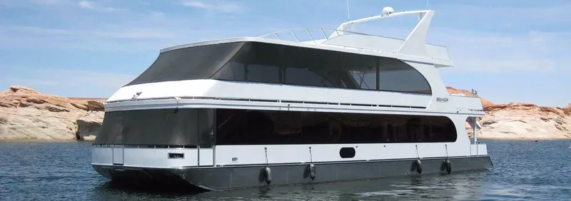 The Image of 2013 Bravada Houseboat Apollo Trip #7 on a serene lake. - 0