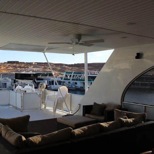Slide: The Image of Bravada Houseboat Apollo Trip #7 2013 model with spacious deck and seating area. - 12
