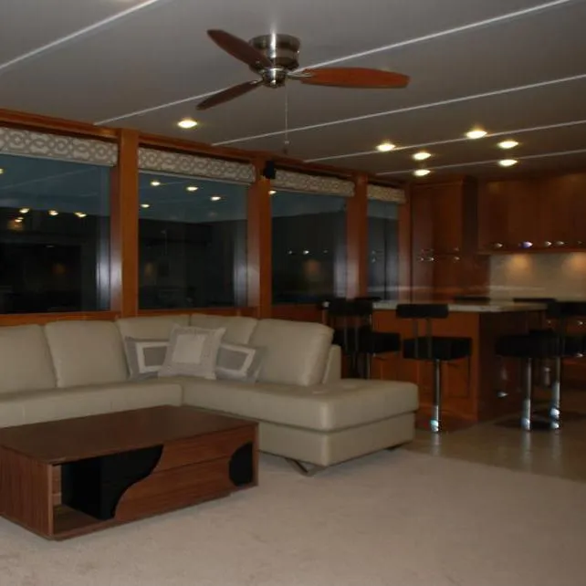 Slide: The Image of Modern interior of 2013 Bravada Houseboat Apollo Trip #7 with leather sofa and kitchen. - 14