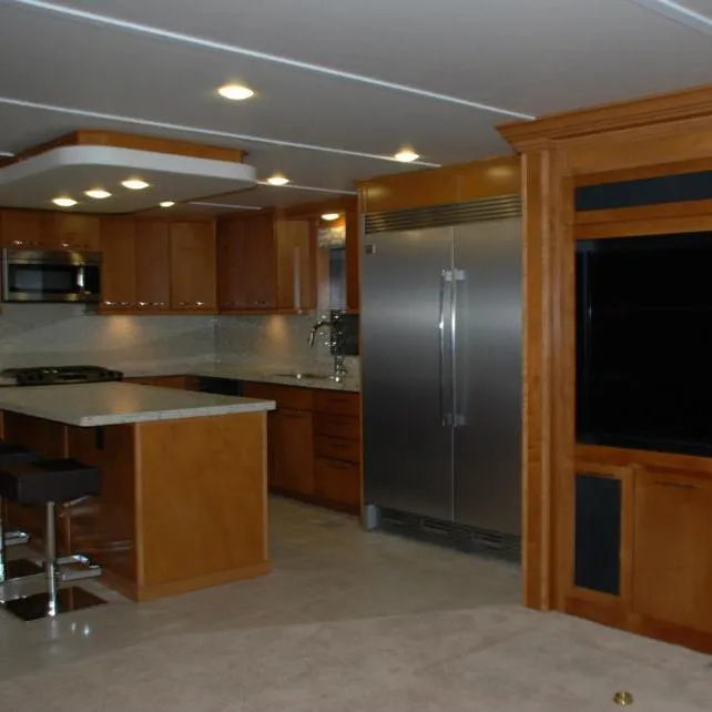 Slide: The Image of Modern kitchen interior of 2013 Bravada Houseboat Apollo Trip #7 with stainless steel appliances. - 16