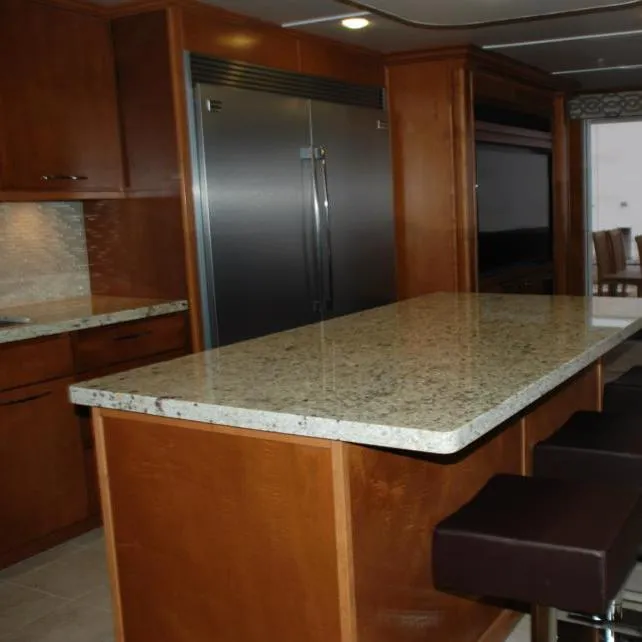 Slide: The Image of Modern kitchen in 2013 Bravada Houseboat Apollo Trip #7 with granite countertops and stainless steel appliances. - 20