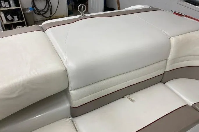 Slide: The Image of Cobalt 246 boat interior seating, white and beige upholstery, 2000 model. - 15