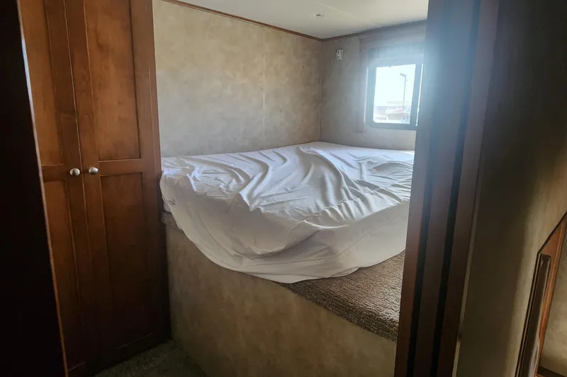 Slide: The Image of White refrigerator in a kitchen with a water dispenser, next to a large water jug. - 8
