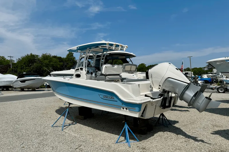 Slide: The Image of Boston Whaler 230 Outrage 2025 - 2