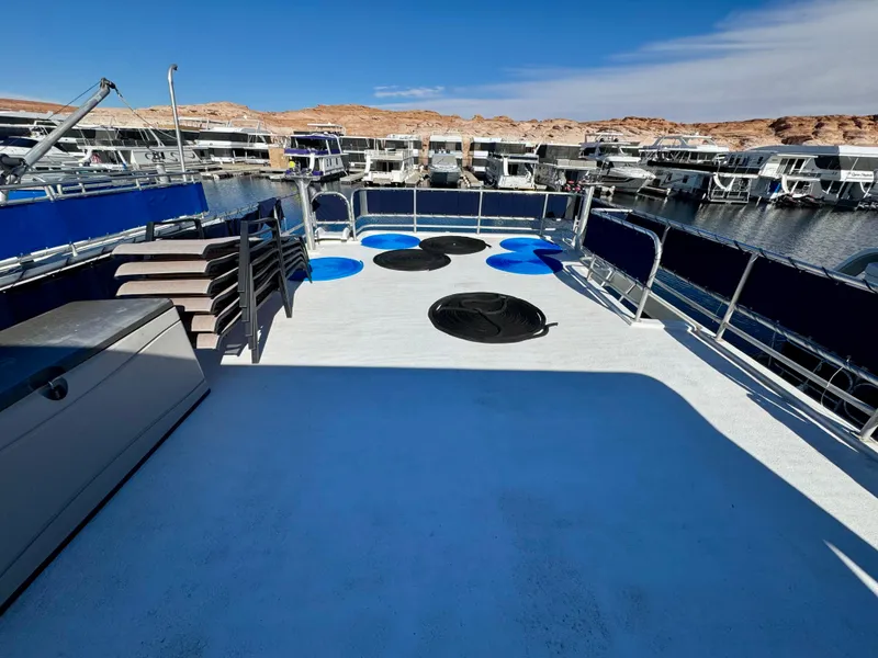 Slide: The Image of Upper deck of 2003 Sharpe Wailea Trip houseboat, docked at marina under clear blue sky. - 31