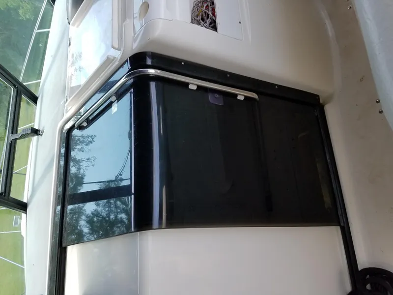 Slide: The Image of 1995 Tiara Yachts 3500 Express interior detail with black and white design elements. - 19