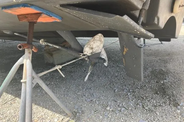 Slide: The Image of 1995 Tiara Yachts 3500 Express propeller and hull on dry dock. - 41