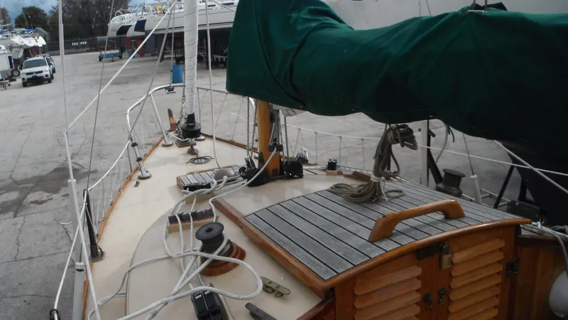 Slide: The Image of Sailboat deck of 1987 Chip Stulen Faering Design 20, docked with green sail cover. - 22