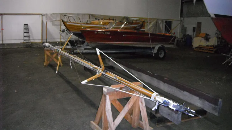 Slide: The Image of Indoor storage of Chip Stulen Faering Design 20 sailboat, 1987 model, with mast on stands. - 24