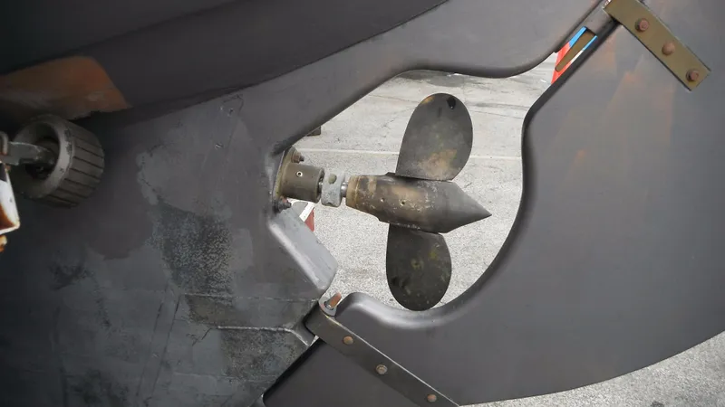 Slide: The Image of Propeller of 1987 Chip Stulen Faering Design 20 boat, close-up view. - 9