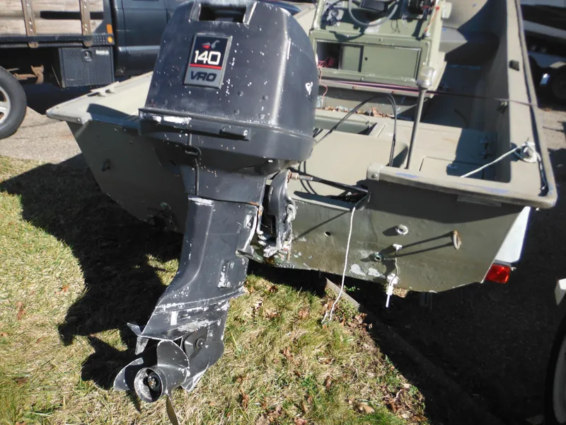 Slide: The Image of 1977 McKee Craft 17S boat with 140 VRO outboard motor. - 8