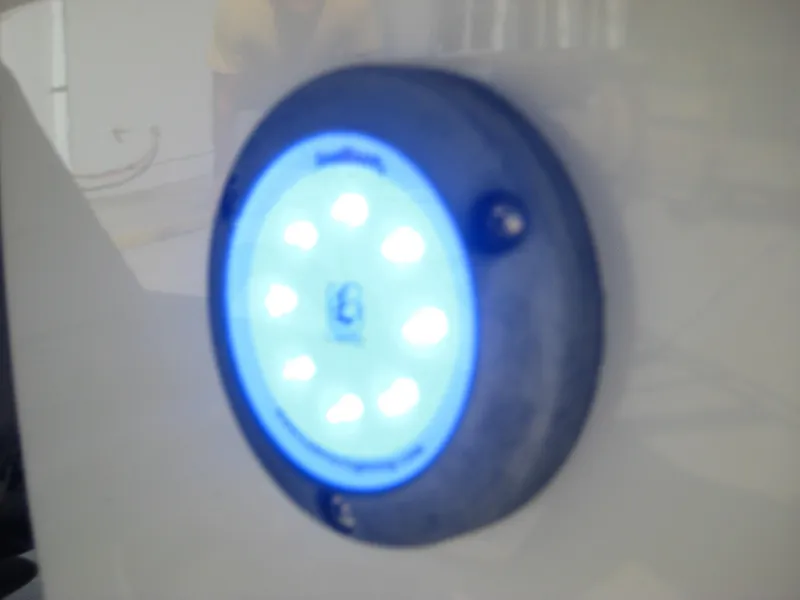 Slide: The Image of Blue LED light on 2015 Chaparral 244 Sunesta boat. - 25