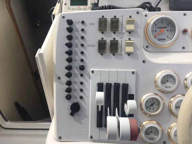 Slide: The Image of 2002 Fountain 38 Express Cruiser control panel close-up. - 14