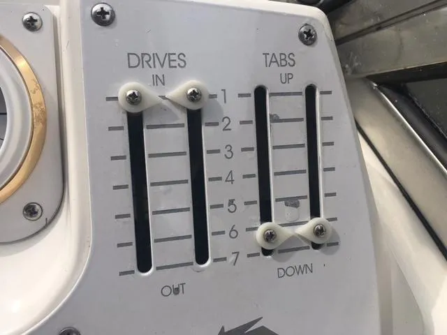 Slide: The Image of Control panel of a 2002 Fountain 38 Express Cruiser boat. - 15