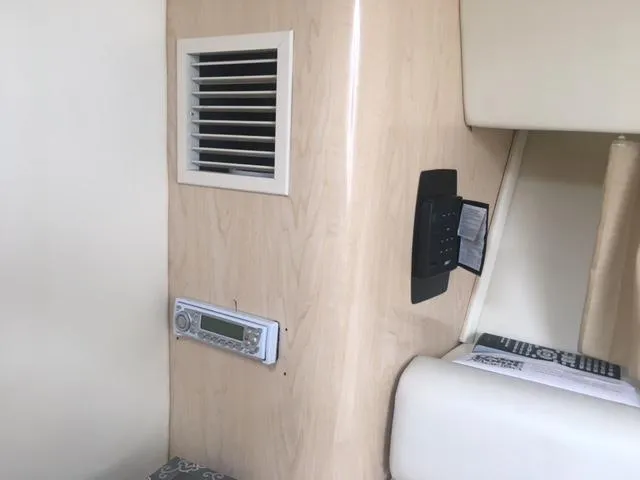 Slide: The Image of Interior of 2002 Fountain 38 Express Cruiser with control panel. - 19